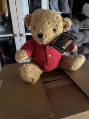 Plush Teddy Bear in Red Knit Polo. Item is New, with Label. Please see picture.