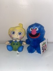 Lot of 2 Sesame Street Grover Plush 50 Years Counting Toy Factory & Wizard of Oz